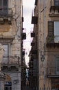 PALERMO, ITALYÃ¢â¬â03 January 2017: Very narrow street between two apartment buildings. Palermo. Sicily